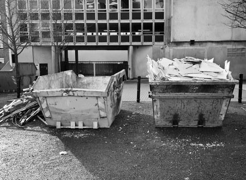 Workers clearing construction debris at a site in Barnet
