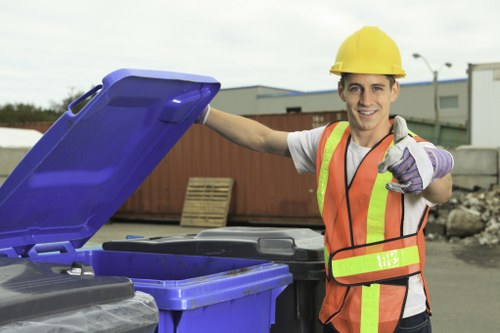 Volunteers loading donated furniture for charity reuse