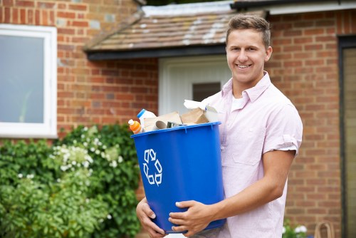 Customer documenting a delivery issue with a skip by taking notes and photos